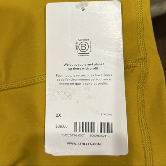 BAG361. NWT Athleta Ultimate Stash 7/8 Long side
Pockets Golden Mustard Leggings - Picture 4 of 6